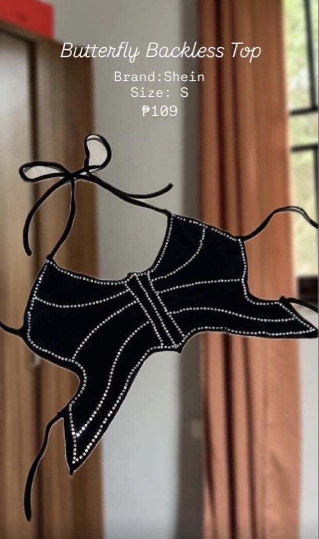 Shein Butterfly Backless Top Size S (Category: Sleeveless) located in Manila. Submitted by coolflower-e6627b (Listing ID 1468527601, Image 1). Description: - Brand: Shein - Size: S - Color: Black - Design: Backless butterfly top with stunning rhinestone outline - Closure: Halter neck tie and back ties - Perfect for: Parties, clubs, and night outs.