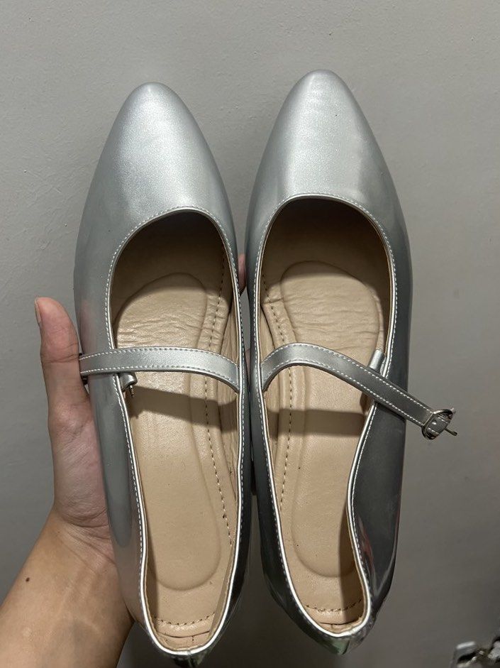 Size 8 Silver Pointed Toe Mary Jane Flats (Category: Flats & Sandals) located in Manila. Submitted by 34samf (Listing ID 1468601141, Image 1). Description: - Color: Silver with tan inner lining - Size 8 - Style: Pointed toe flats with Mary Jane strap and buckle - Condition: Brand new, never worn outside - Soles: 100% clean with zero scuffs or wear marks Location: Manila📍.