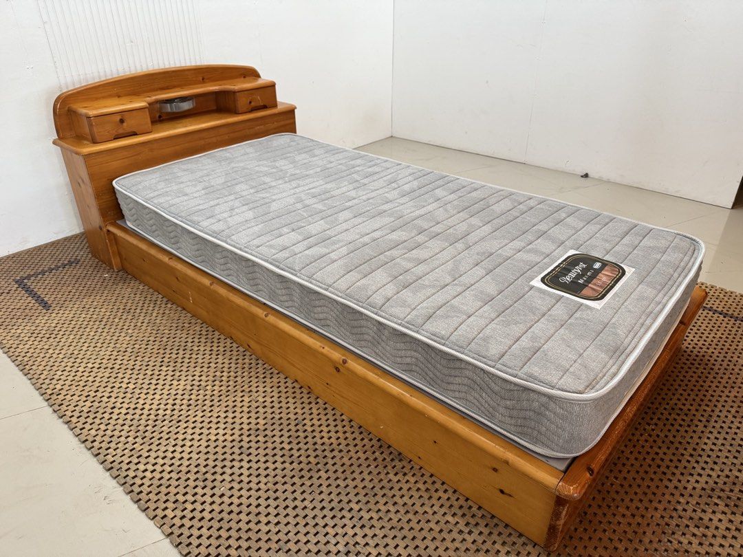 Single bedset with storage (Category: Bed Frames & Mattresses) located in Quezon City. Submitted by matetdevis13 (Listing ID 1468676859, Image 2). Description: Elegant Wooden Single Size with Storage & Simmons Maxima Mattress Bed Set Price: 8,900 Frame: 43 x 87 x 29/9 Mattress: 38 x 77 x 5.5 In good condition Code MJS48-MJ454.
