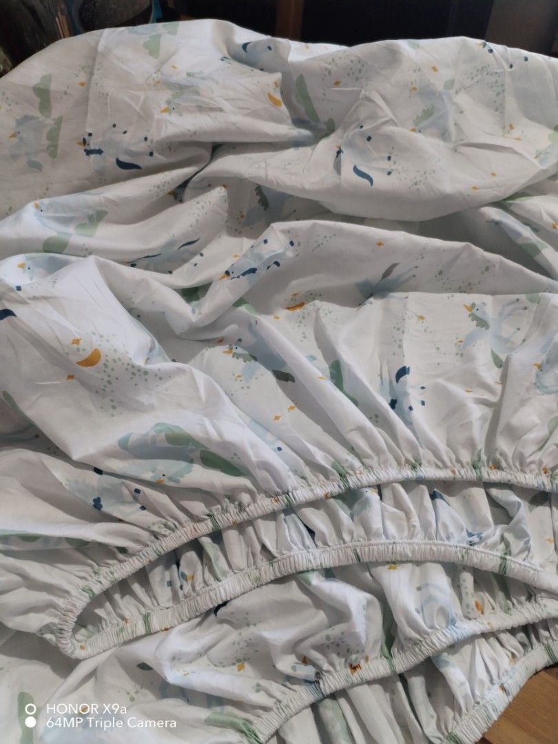 Single Size Bedsheets ( Polyester) (Category: Bedding & Towels) located in Muntinlupa City. Submitted by arciagamaryann68 (Listing ID 1468568920, Image 3). Description: - Size: Single - Material: Polyester fabric, lightweight and soft - Design: Charming unicorn, star, and moon print in pastel colors - Fit: Fully garterized edges for easy fitting and secure hold on mattress - Condition: Good, clean, and ready to use - Ideal for: Kids' rooms or sin