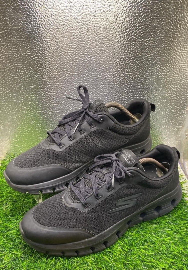 Skechers Go Walk Black Sneakers (Category: Activewear) located in Manila. Submitted by nel_besario.1992 (Listing ID 1468628944, Image 1). Description: - Brand: Skechers Go Walk - Color: All Black - Upper: Breathable mesh with a durable rubber toe cap - Sole: Thick cushioned sole for all-day walking comfort - Closure: Lace-up with matching black laces - Style: Minimalist design, clean look, easy to pair with daily outfits.