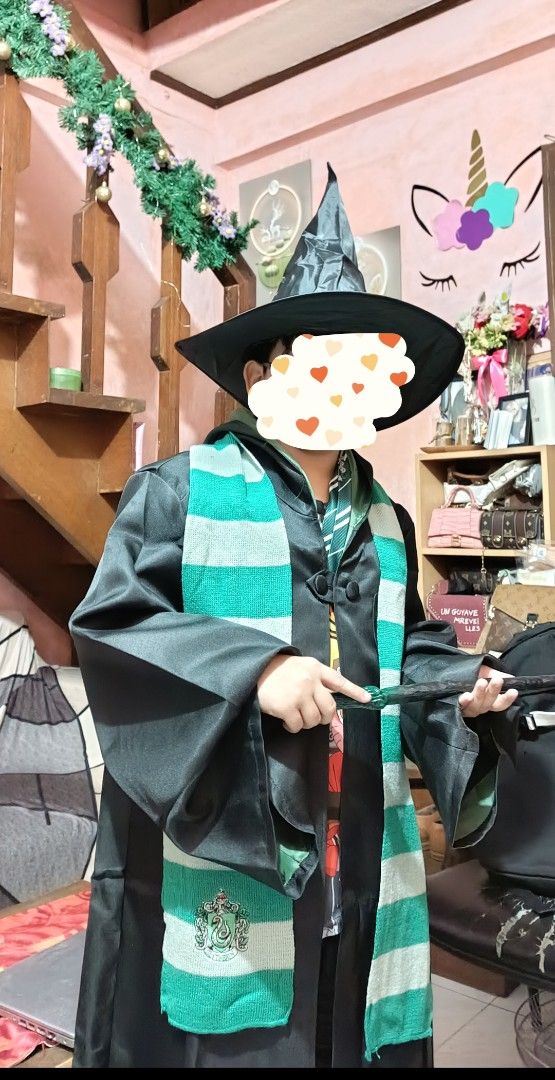 Slytherin Hogwarts Costume 7-Piece set (Category: Coats, Jackets and Outerwear) located in Quezon City. Submitted by kazuxxxx (Listing ID 1468615049, Image 2). Description: rfs: badly need money for school - 7pieces complete Slytherin costume set 1 Cloak 1 Scarf(170cm*17cm) (With badges) 1 Tie(With badges) 1 magic wand 1 Necklace 1 Glassed (without lens) 1 Hat - Ideal for Halloween, cosplay, and themed parties - bought it last week, used it once 
