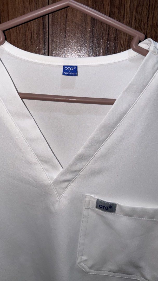 Small OTG Airstretch (Category: Sets & Coordinates) located in Malabon City. Submitted by hanschannn (Listing ID 1468563234, Image 2). Description: Small OTG Airstretch Scrubs🤍 Selling my OTG Airstretch Scrubs, worn for only 2 weeks and still in great condition! Well taken care of. I already have a regular hospital uniform, so I’m letting these go. Original receipt, tags, and paper bag included for possible custom embroidery at OTG. 📌 INCLUSION