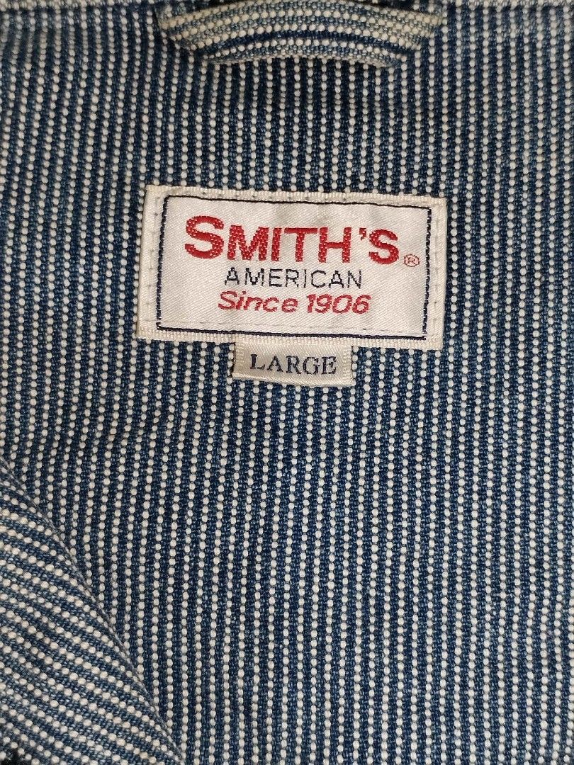 SMITH’S AMERICAN ​Hickory Stripe Workwear Chore Jacket (Category: Coats, Jackets and Outerwear) located in Baguio. Submitted by luxeloomarchive (Listing ID 1468514603, Image 2). Description: SMITH’S AMERICAN ​Hickory Stripe Workwear Chore Jacket ​Classic vintage-style workwear chore jacket by Smith’s American. Crafted in a durable blue and white hickory stripe pattern, featuring dual buttoned chest pockets, heavy-duty dark buttons, and signature 