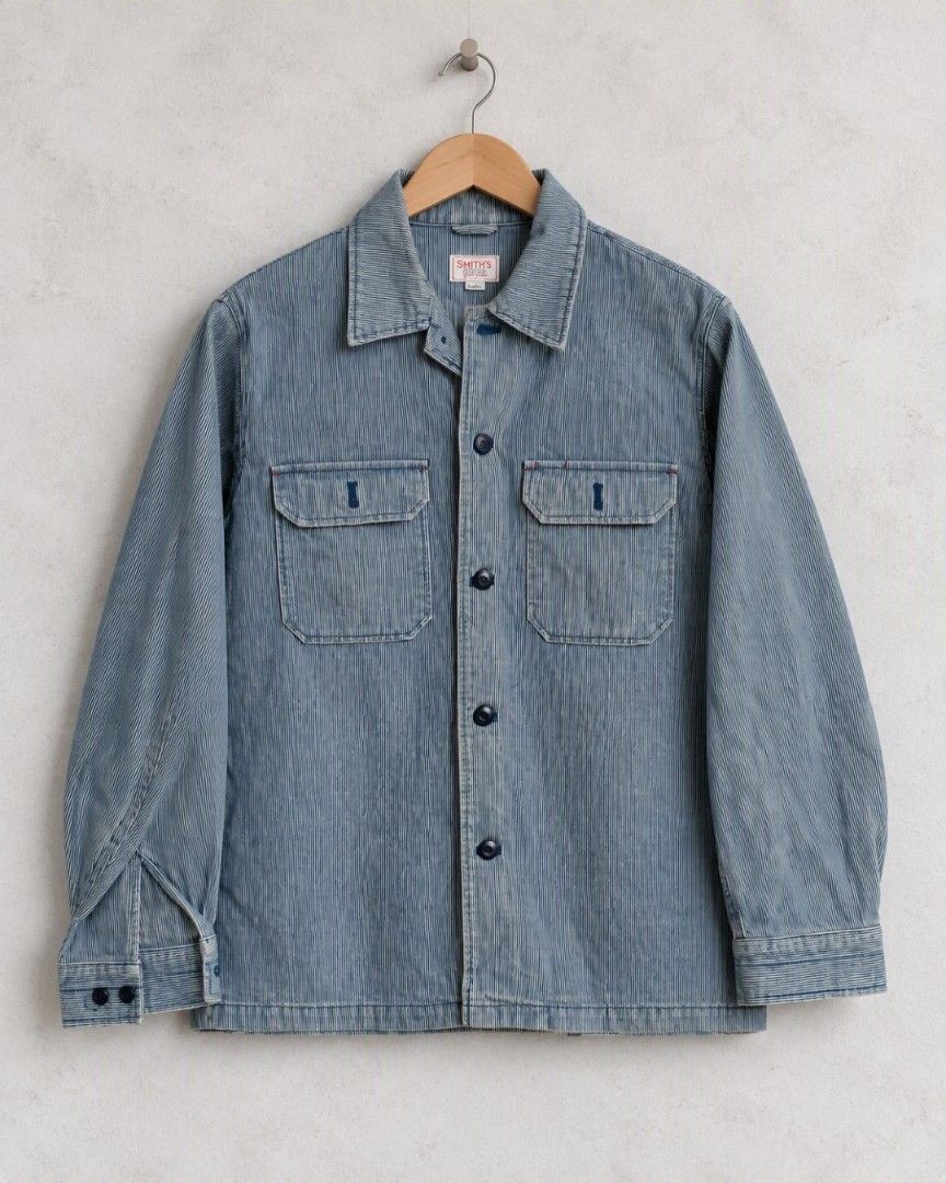 SMITH’S AMERICAN ​Hickory Stripe Workwear Chore Jacket (Category: Coats, Jackets and Outerwear) located in Baguio. Submitted by luxeloomarchive (Listing ID 1468514603, Image 1). Description: SMITH’S AMERICAN ​Hickory Stripe Workwear Chore Jacket ​Classic vintage-style workwear chore jacket by Smith’s American. Crafted in a durable blue and white hickory stripe pattern, featuring dual buttoned chest pockets, heavy-duty dark buttons, and signature 