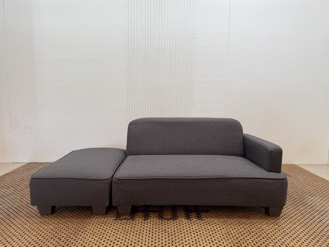 Sofe with ottoman (Category: Sofas) located in Quezon City. Submitted by matetdevis13 (Listing ID 1468676184, Image 1). Description: Modern Gray Fabric Sofa with Detachable Ottoman Price: 7,500 L63/43 x W30 x H22/12 In good condition Code MJS43-MJ442 The separate section can be used beside the sofa as a chaise extension or moved in front as a large ottoman/footrest, which makes “modular” or “detachable ottoman”..