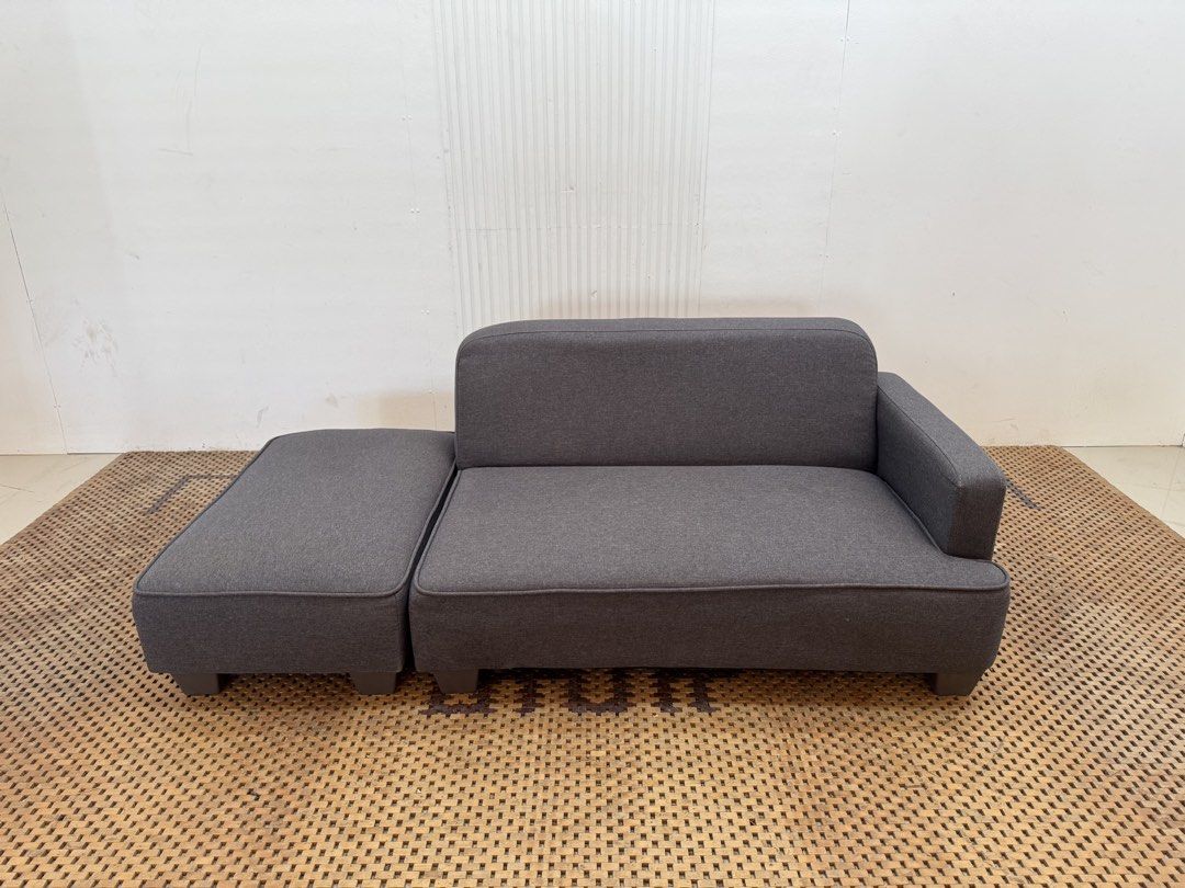 Sofe with ottoman (Category: Sofas) located in Quezon City. Submitted by matetdevis13 (Listing ID 1468676184, Image 2). Description: Modern Gray Fabric Sofa with Detachable Ottoman Price: 7,500 L63/43 x W30 x H22/12 In good condition Code MJS43-MJ442 The separate section can be used beside the sofa as a chaise extension or moved in front as a large ottoman/footrest, which makes “modular” or “detachable ottoman”..
