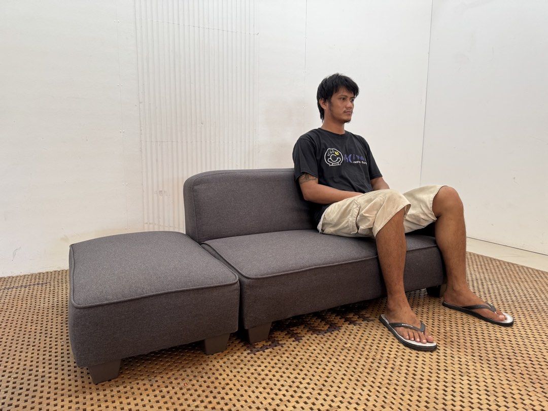Sofe with ottoman (Category: Sofas) located in Quezon City. Submitted by matetdevis13 (Listing ID 1468676184, Image 3). Description: Modern Gray Fabric Sofa with Detachable Ottoman Price: 7,500 L63/43 x W30 x H22/12 In good condition Code MJS43-MJ442 The separate section can be used beside the sofa as a chaise extension or moved in front as a large ottoman/footrest, which makes “modular” or “detachable ottoman”..