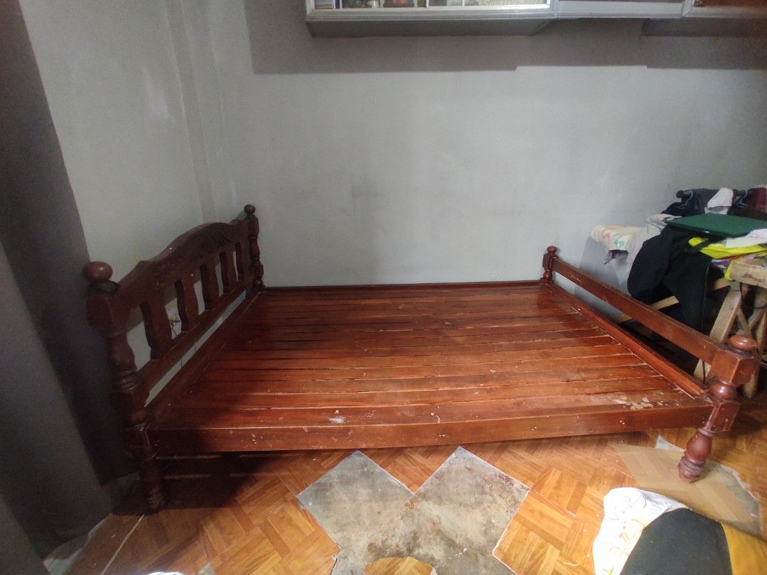 Solid Wood Bed Frame (RUSH SALE) (Category: Bed Frames & Mattresses) located in Caloocan City. Submitted by eri.grass_ (Listing ID 1468523186, Image 3). Description: - Type: Wooden bed frame (Standard double or queen size) - Note: Mattress is not included ‼️ RUSH SALE ‼️ Kunin niyo na po today. South Caloocan Brgy. 16 ang location. ₱1,500 na lang pero slightly negotiable pa rin basta sure buyer. May minor crack lang sa kahoy pero di lumulundo. Ma