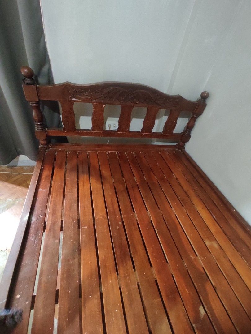 Solid Wood Bed Frame (RUSH SALE) (Category: Bed Frames & Mattresses) located in Caloocan City. Submitted by eri.grass_ (Listing ID 1468523186, Image 1). Description: - Type: Wooden bed frame (Standard double or queen size) - Note: Mattress is not included ‼️ RUSH SALE ‼️ Kunin niyo na po today. South Caloocan Brgy. 16 ang location. ₱1,500 na lang pero slightly negotiable pa rin basta sure buyer. May minor crack lang sa kahoy pero di lumulundo. Ma