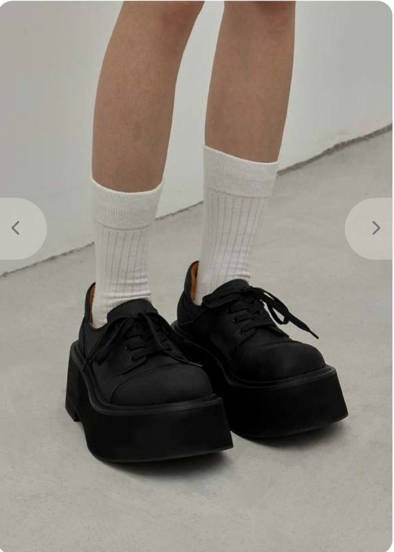 Sonder Plan Black Derby Chunky shoes (Category: Loafers) located in Davao. Submitted by vndrgd (Listing ID 1468607849, Image 1). Description: - Color: Black with tan inner lining - Style: Chunky platform shoes with thick, heavy rubber soles - Design: Round toe, lace-up front closure, super bold silhouette - Condition: Light scuffs on the toe caps and edges of the platform - Styling: Great for alt, grunge, or streetwear looks, best paired with chu