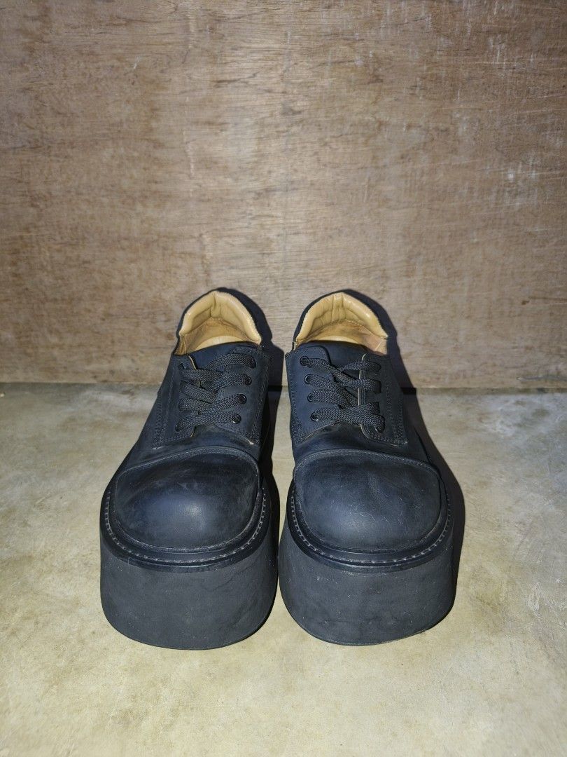 Sonder Plan Black Derby Chunky shoes (Category: Loafers) located in Davao. Submitted by vndrgd (Listing ID 1468607849, Image 3). Description: - Color: Black with tan inner lining - Style: Chunky platform shoes with thick, heavy rubber soles - Design: Round toe, lace-up front closure, super bold silhouette - Condition: Light scuffs on the toe caps and edges of the platform - Styling: Great for alt, grunge, or streetwear looks, best paired with chu