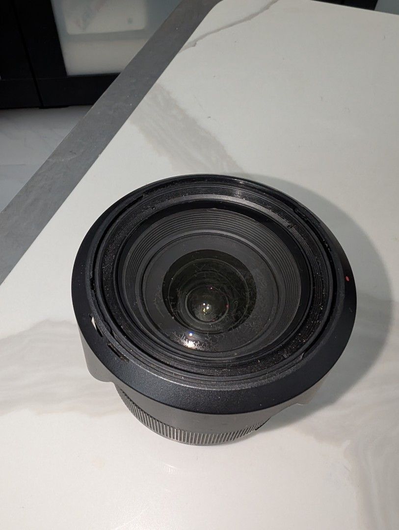 Sony 2.8/16-50 SSM Lens (Category: Lens & Kits) located in Santa Rosa. Submitted by vansting (Listing ID 1468505593, Image 2). Description: - Sony 16-50mm f/2.8 SSM zoom lens for Alpha mount DSLR cameras - Constant f/2.8 maximum aperture across the entire zoom range - Includes original front lens cap and dedicated petal lens hood - Cosmetically used with noticeable barrel dust and external wear - Glass elements may dumi.