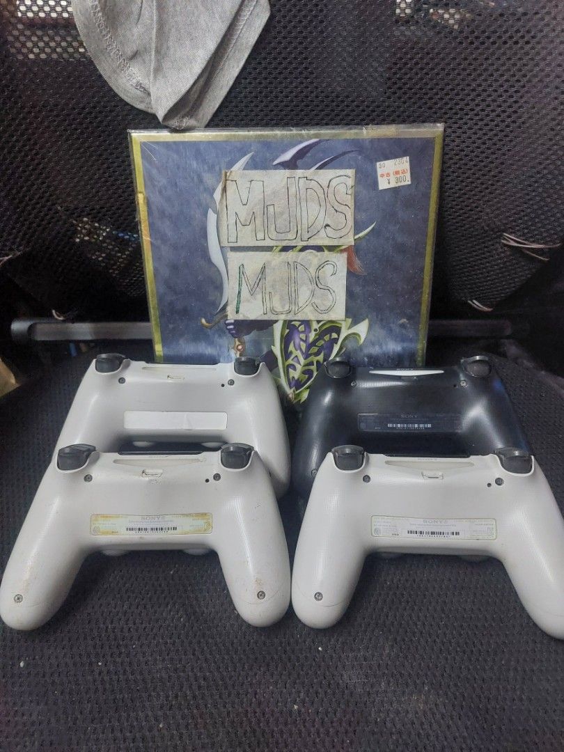 Sony PlayStation 4 Controllers V2 (Category: Controllers) located in Quezon City. Submitted by kushala140 (Listing ID 1468644664, Image 2). Description: DualShock 4 Original Version 2 Black White Silver Transparent Tested Working 1200 each Good All Buttons Good Analogs Good Battery Good Wireless Good Charging Good Tracking Pad Good Vibrations Controller only No cables included Check out pictures for more details 1200 each No Warranty Test2sawa on