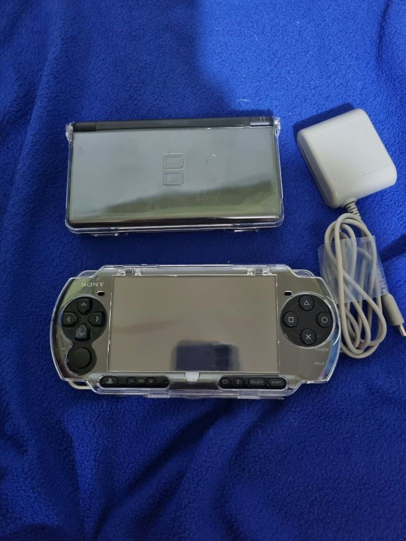 Sony PSP-2000 PlayStation Portable Console Boxed (Category: PlayStation) located in Angeles City. Submitted by roshangaming (Listing ID 1468568797, Image 3). Description: - Sony PSP-2000 handheld console in original box - Includes power adapter and spare battery pack - 8GB memory stick included for storage - Comes with original manuals and clear protective hard case - Stored neatly in original packaging inserts - Perfect all-in-one retro gaming b