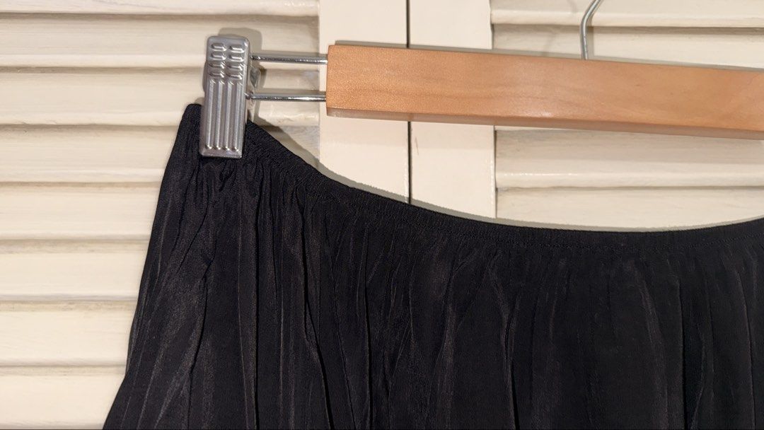 Black Off-Shoulder Blouse with Tiered Ruffle Sleeves (Category: Blouses) located in Manila. Submitted by oliviablanche (Listing ID 1468607185, Image 3). Description: - Bought in Spain - Color: Black - Style: Off-shoulder top with tiered ruffle sleeves - Fit: Stretchy elastic neckline, lightweight material - Versatility: Easy to pair with jeans or a skirt for a night out - Condition: Worn only once, clean and like new - Mode of Payment: GCash, BDO