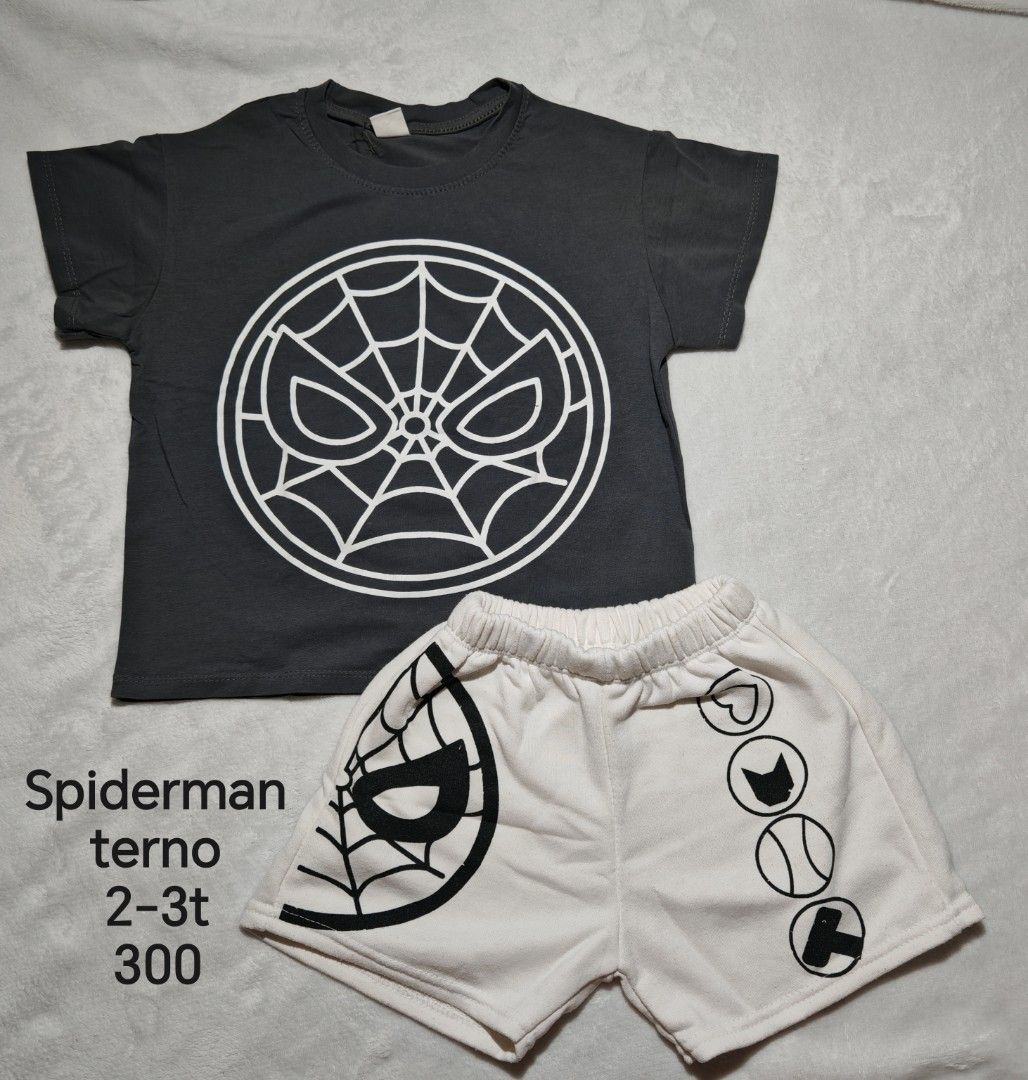 Spiderman Terno 2-3t (Category: Babies & Kids Fashion) located in Quezon City. Submitted by maypamor (Listing ID 1468515508, Image 1). Description: - Item: Spiderman Terno (Two-piece set) - Top: Dark grey with large web and eye graphic - Bottoms: Off-white shorts with cool black print details - Condition: Excellent - Perfect for toddler casual wear and daily lakad.