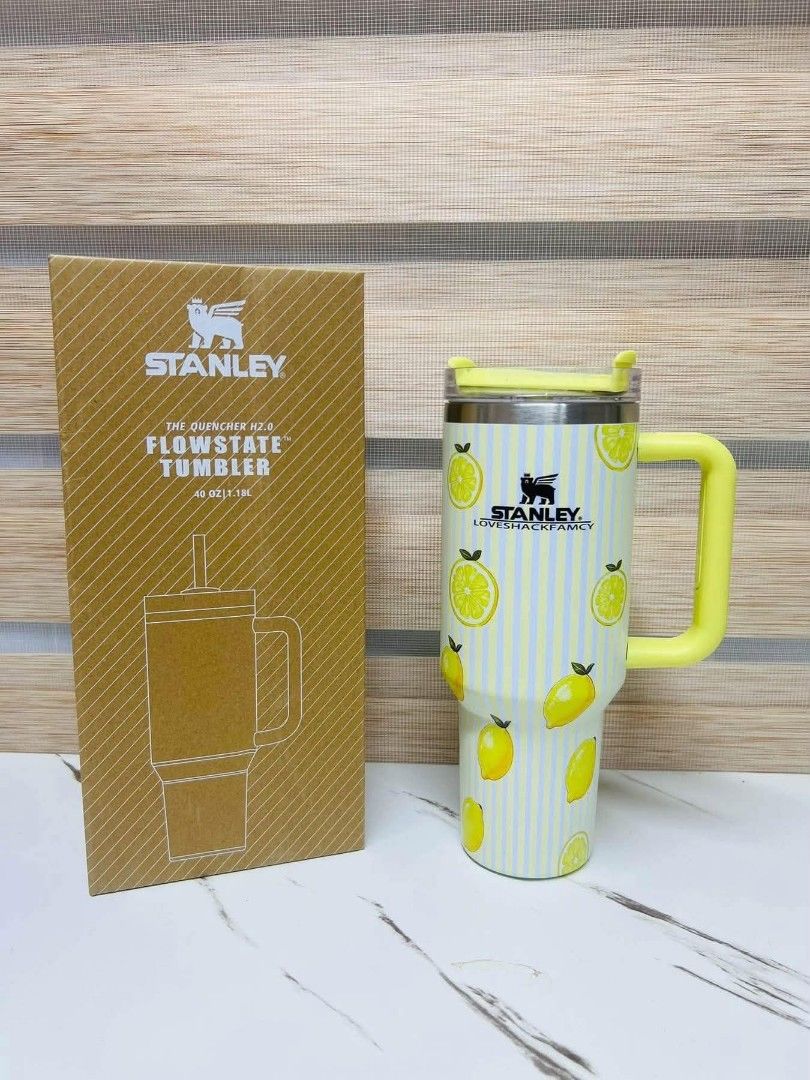 Stanley x LoveShackFancy 40oz Flowstate Tumbler (Category: Water Bottles & Tumblers) located in Santo Domingo. Submitted by krizzies_korner (Listing ID 1468543141, Image 2). Description: - 100% Authentic Stanley x LoveShackFancy Quencher H2.0 Tumbler - Generous 40oz (1.18L) capacity to keep you hydrated all day - Advanced Flowstate lid and sturdy side handle for easy sipping - Keeps beverages ice cold for hours - Choice of gorgeous prints: Lemons
