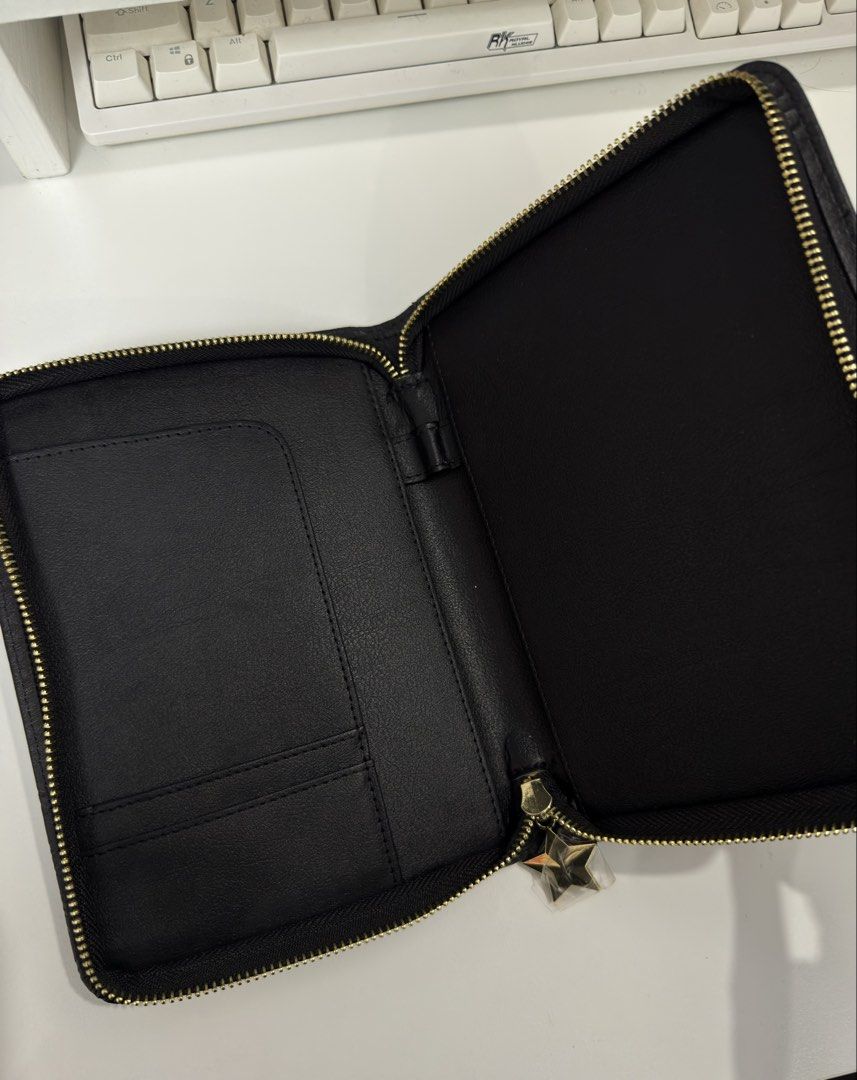 Starbucks Black Leather Planner and Pouch Set (Category: Stationery & School Supplies) located in Manila. Submitted by chi.declutter (Listing ID 1468519298, Image 2). Description: - Brand new authentic Starbucks organizer set in sleek black - Features embossed Siren logo and elegant scallop pattern detailing - Premium gold-tone hardware with star zipper pull still wrapped in plastic - Includes zippered binder folio with card slots and a convenien