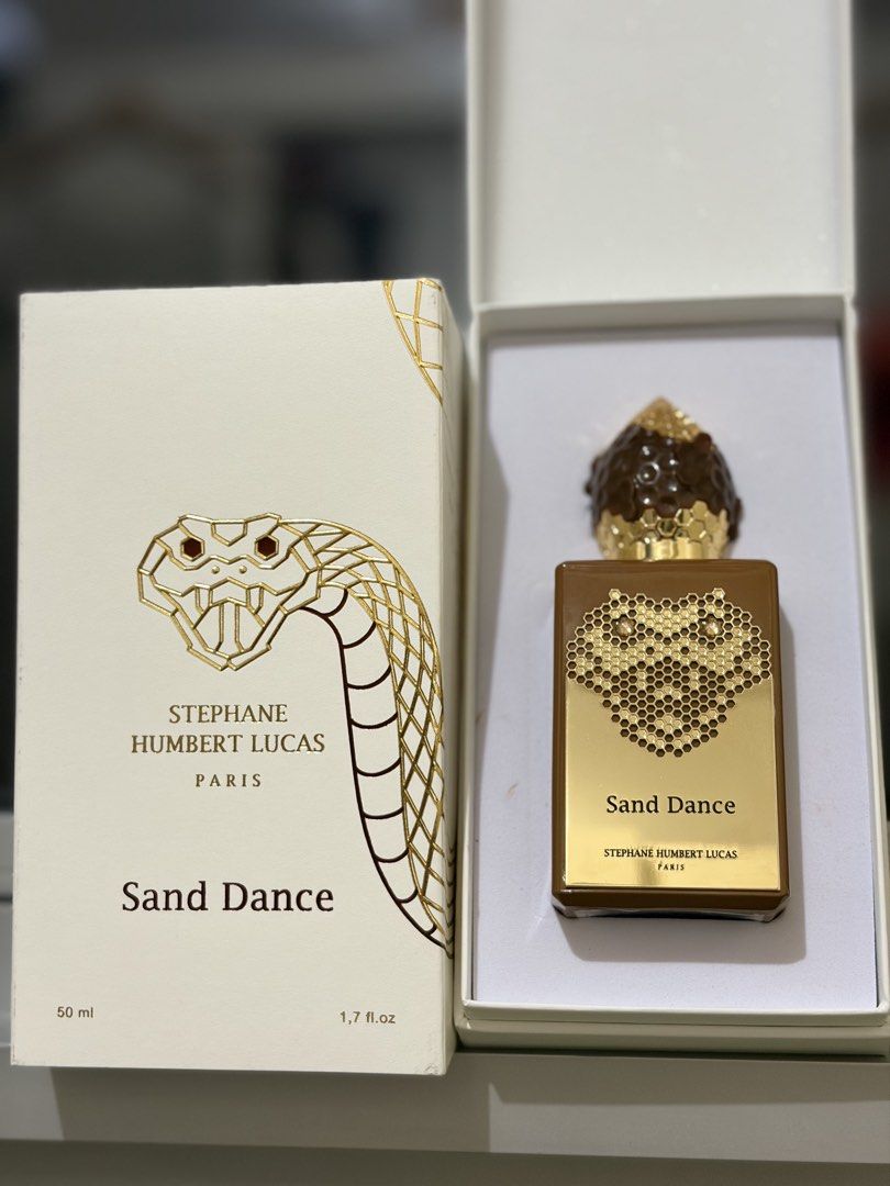 Stephane Humbert Lucas Sand Dance 50ml EDP (Category: Fragrance & Deodorants) located in Manila. Submitted by MisyeeelCunyaaa (Listing ID 1468652708, Image 1). Description: - Brand: Stephane Humbert Lucas - Fragrance: Sand Dance - Size: 50ml (Unisex) - Scent Profile: Warm spicy, woody, amber, cacao, and whiskey notes - Condition: Pristine, like new - Inclusions: Complete with original designer box and iconic decorative snake cap - 100% authentic 