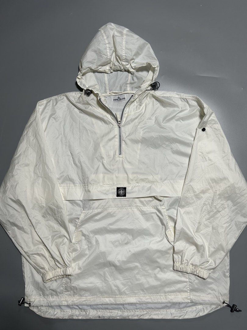 Stone island wind breaker (Category: Coats, Jackets and Outerwear) located in Trece Martires City. Submitted by flip_flips (Listing ID 1468527002, Image 1). Description: Stone island wind breaker -Dimes: 30 width 32 length -Excellent condition -9.5/10 color rate -issue: minor dot stains, cut wash tag.
