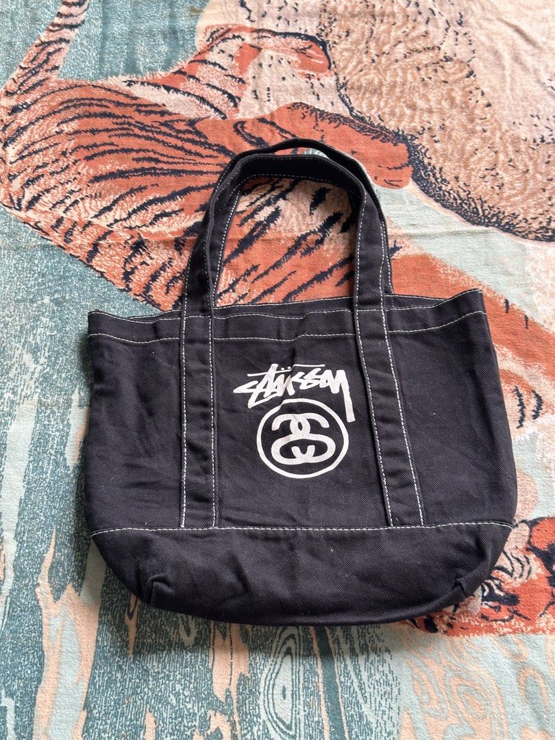 Stüssy mini tote bag (Category: Luxury Bags & Wallets) located in Los Banos. Submitted by streetwear.collections (Listing ID 1468642573, Image 1). Description: Stüssy mini tote bag Excellent condish Php 1300 Thanks! .