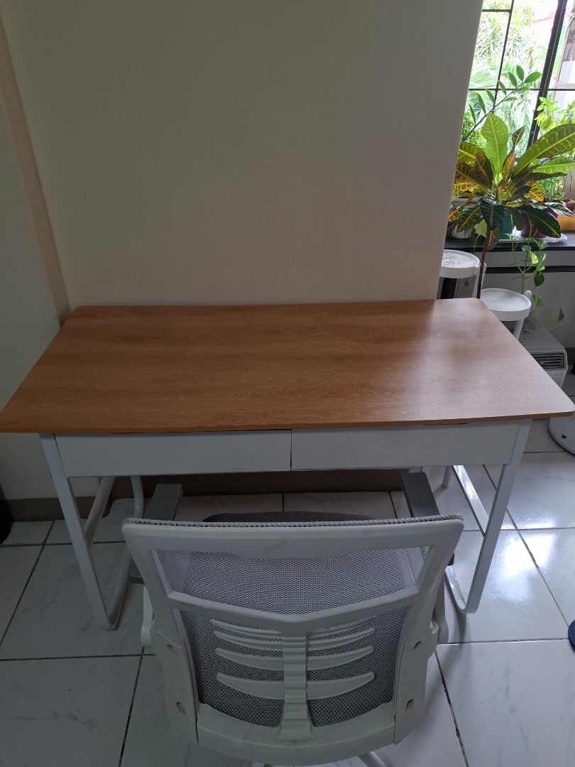 Study Desk and Mesh Office Chair (Category: Office Furniture & Fixtures) located in Caloocan City. Submitted by kevinaquin23340 (Listing ID 1468533017, Image 3). Description: - Complete modern setup ideal for home office or student room - Wooden top study desk featuring 2 white pull-out drawers and sturdy metal legs - Matching white office chair with breathable grey mesh back and seat - Chair includes rolling wheels and convenient foldable armres