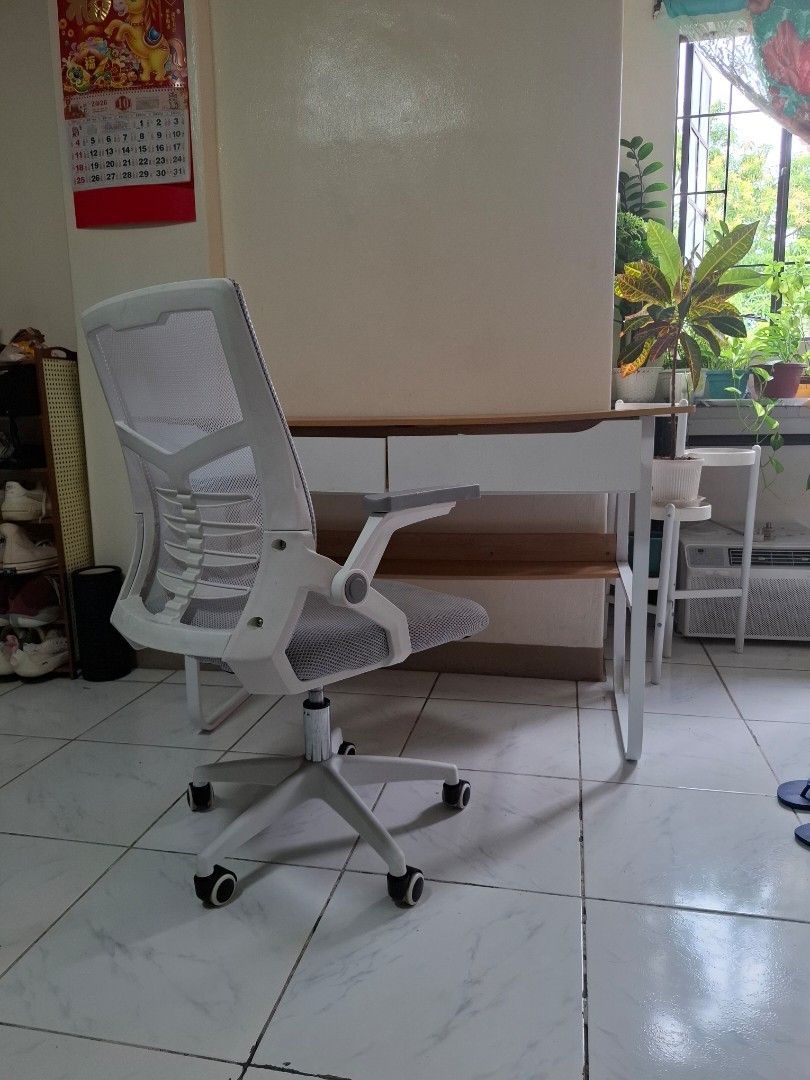 Study Desk and Mesh Office Chair (Category: Office Furniture & Fixtures) located in Caloocan City. Submitted by kevinaquin23340 (Listing ID 1468533017, Image 2). Description: - Complete modern setup ideal for home office or student room - Wooden top study desk featuring 2 white pull-out drawers and sturdy metal legs - Matching white office chair with breathable grey mesh back and seat - Chair includes rolling wheels and convenient foldable armres