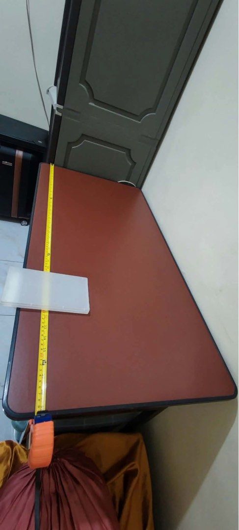 Study/Work Table (Category: Tables & Sets) located in Manila. Submitted by bbingsulover (Listing ID 1468552216, Image 2). Description: ₱500 (still negotiable!) - Wooden study desk with durable black metal folding legs - Sturdy build that folds completely flat for easy storage - Ideal for work from home (WFH), studying, or crafting - Clean surface with minor wear from normal use .