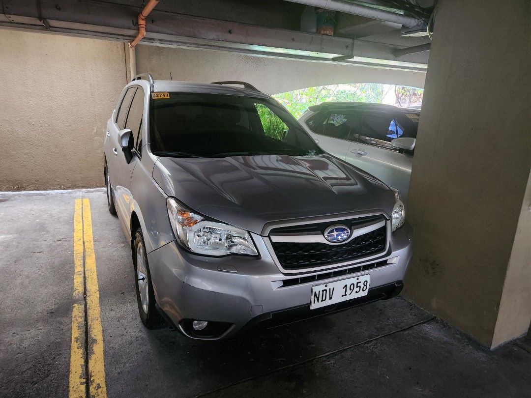 Subaru Forester 2.0 i (A) (Category: Used Cars) located in Mandaluyong City. Submitted by fastshark0522 (Listing ID 1468602910, Image 1). Description: 2015 subaru forester 15349 original mileage barely used. almost new upholstery like new no issues. coding car only 1st owner. house and office use negotiable. rush sale see to appreciate unit san juan location only flaw is peeling of steering wheel and slight scratch on bumper.