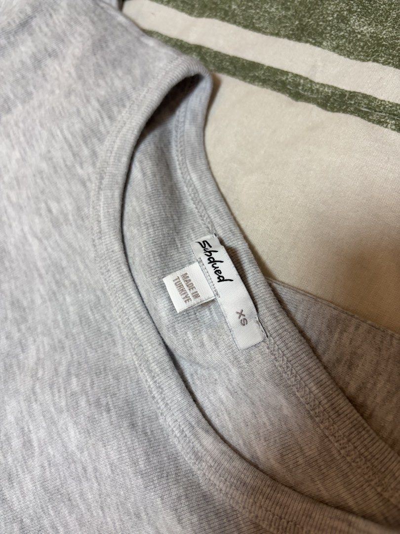 Subdued Angel Wings Tee in Melange Gray (Category: Shirts) located in Quezon City. Submitted by morespace555 (Listing ID 1468638898, Image 3). Description: Slightly negotiable! #subdued #brandymelville #edikted #hollister.