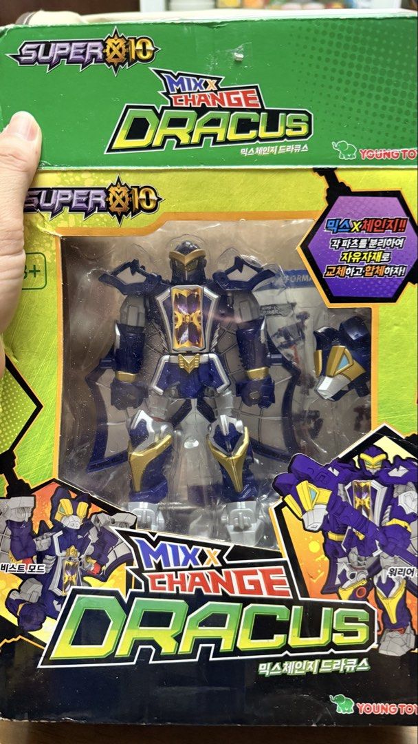 SUPER 10 Mix & Change Dracus Action Figure (Category: Figurines & Statues) located in Pilar. Submitted by faveanyshop (Listing ID 1468551953, Image 2). Description: - Authentic Young Toys Super Ten Dracus transformer figure - Striking blue and gold armor design featuring bat-style wings - Dual modes: easily transforms between warrior mode and beast mode - Complete set includes the original box, inner plastic tray, and instruction manual - Note: B