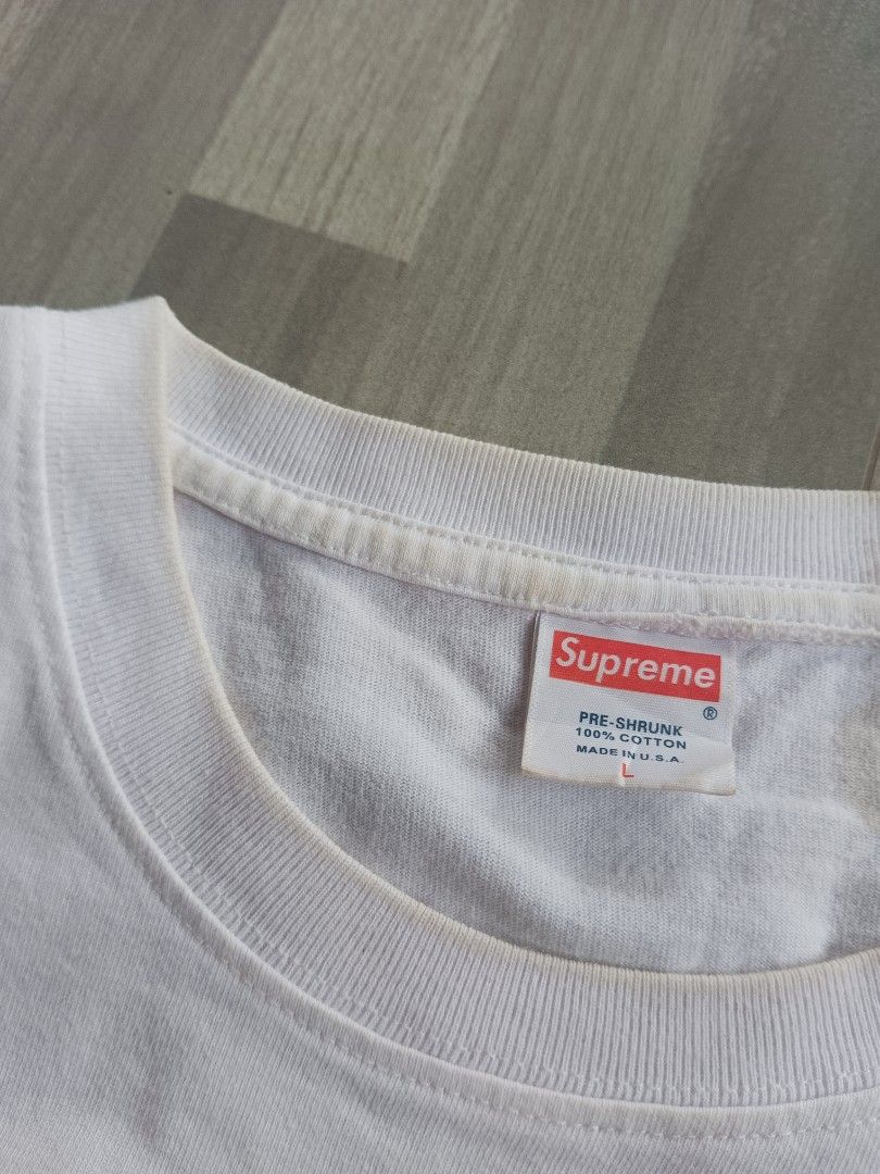 Supreme Bear Graphic White T-Shirt Size L (Category: Tshirts & Polo Shirts ) located in Manila. Submitted by charleshustla (Listing ID 1468534281, Image 2). Description: - White graphic t-shirt with teddy bear, red bandana, and SUP box logo design - Size: Large (tag inside collar) - Material: 100% pre-shrunk cotton, made in USA - Comfort: Soft and comfortable cotton fabric - Condition: Noticeable yellowing around the neckline from previous wear -