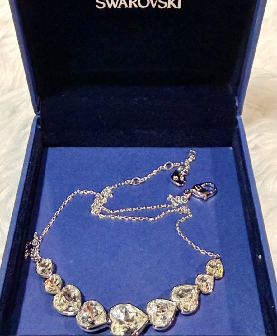 Swarovski Necklace (Category: Necklaces) located in Quezon City. Submitted by liezl.marie (Listing ID 1468686237, Image 2). Description: A Swar0vski Crystal Heart Necklace with a 9-heart crystal design. 4,800 Open for layaway. Disclaimer: We are not affiliated, associated, authorized, endorsed by or in any way officially connected with any other company or luxury brand. All copyrights are reserved to the original brand..