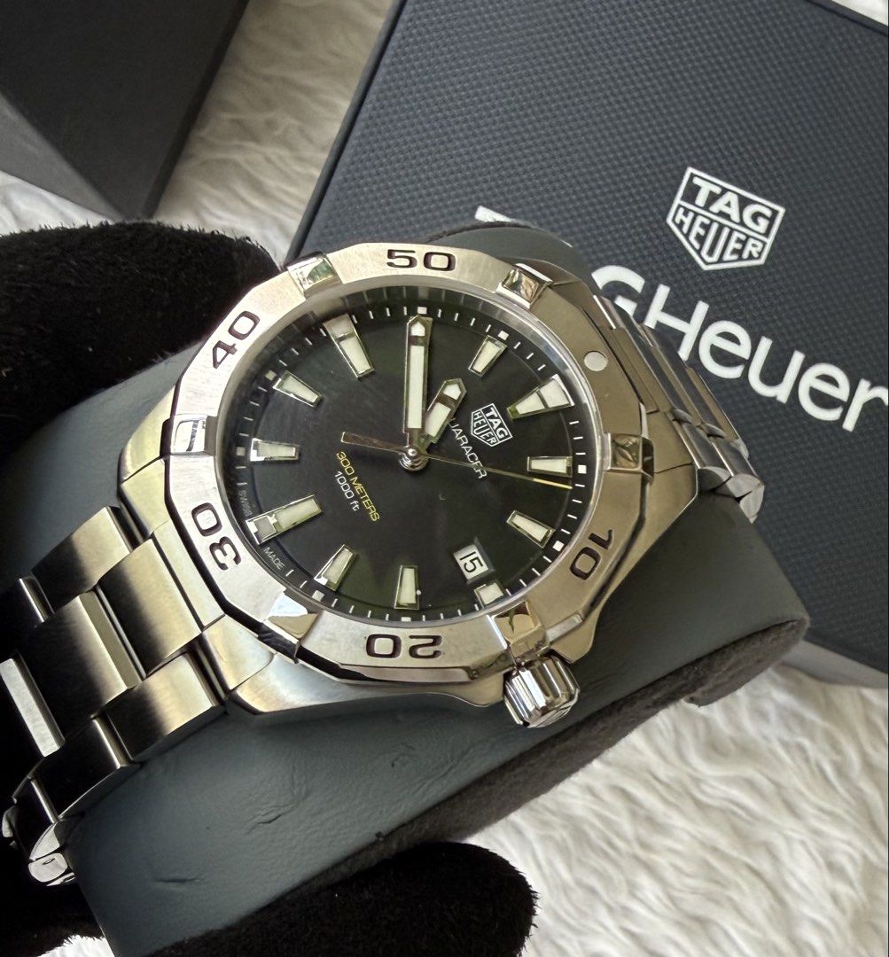 Tag Heuer Aquaracer Black Dial (Category: Luxury Watches) located in Quezon City. Submitted by pedro_demain (Listing ID 1468641036, Image 3). Description: Tag heuer Aquaracer Black Dial Wbd1110 model 41mm quartz With box,manual ,card & extra link 9/10 condition Qc & Bgc area 09955225741.