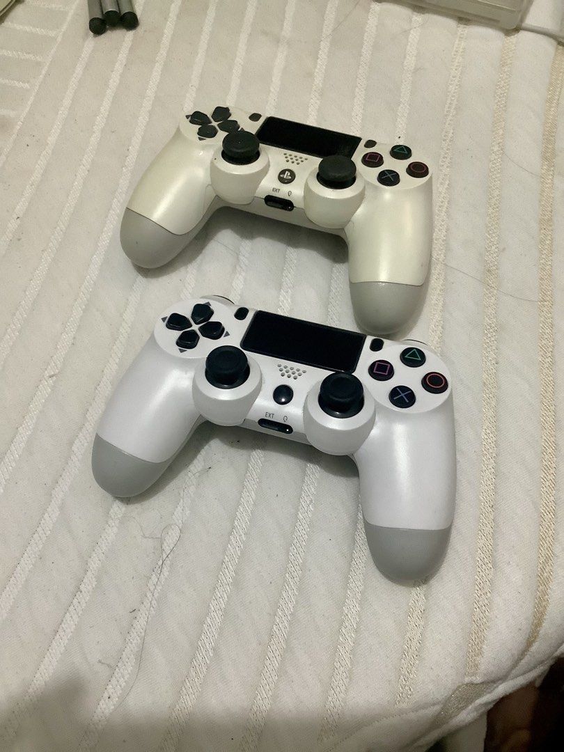 Take Both Ps4 Controllers (Category: Controllers) located in Rizal. Submitted by casheworks (Listing ID 1468703796, Image 1). Description: Take both Ps4 Controllers Fully Working Usb cable not included Honest Issue: Other controller has a slight drift RFS: Upgrading 📍Angono, Rizal.