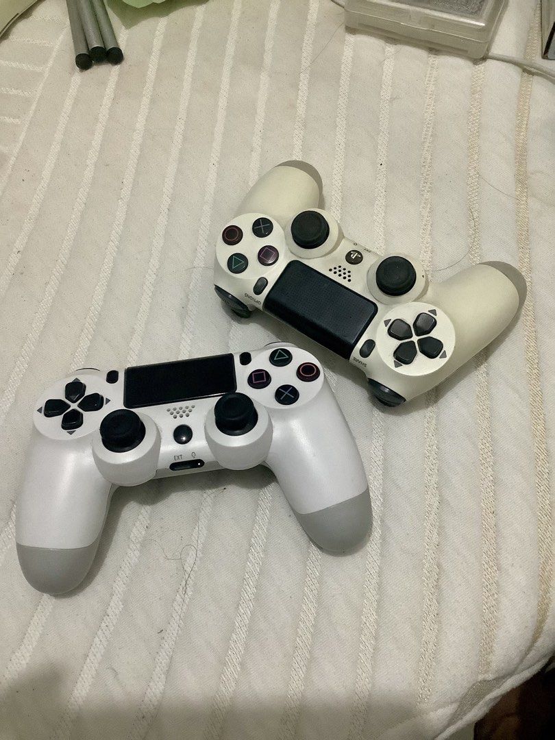Take Both Ps4 Controllers (Category: Controllers) located in Rizal. Submitted by casheworks (Listing ID 1468703796, Image 2). Description: Take both Ps4 Controllers Fully Working Usb cable not included Honest Issue: Other controller has a slight drift RFS: Upgrading 📍Angono, Rizal.