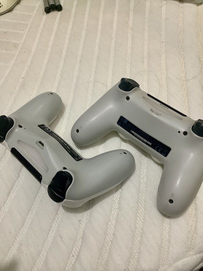 Take Both Ps4 Controllers (Category: Controllers) located in Rizal. Submitted by casheworks (Listing ID 1468703796, Image 3). Description: Take both Ps4 Controllers Fully Working Usb cable not included Honest Issue: Other controller has a slight drift RFS: Upgrading 📍Angono, Rizal.