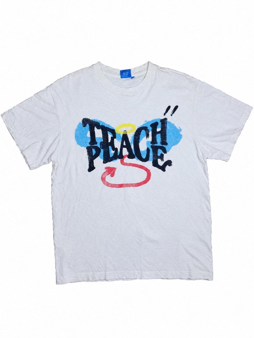 TEACH PEACE SHIRT (Category: Formal Shirts) located in Iligan City. Submitted by jydsale. (Listing ID 1468624689, Image 1). Description: 🤍 TEACH PEACE Graphic T-Shirt 😈😇 - White T-shirt with unique front and back graphics - Eye-catching devil and angel design on the back - Colorful “TEACH PEACE” graphic on the front - Classic crew neck with short sleeves - Perfect for casual wear and streetwear outfits - Thrifted item with visible signs of use