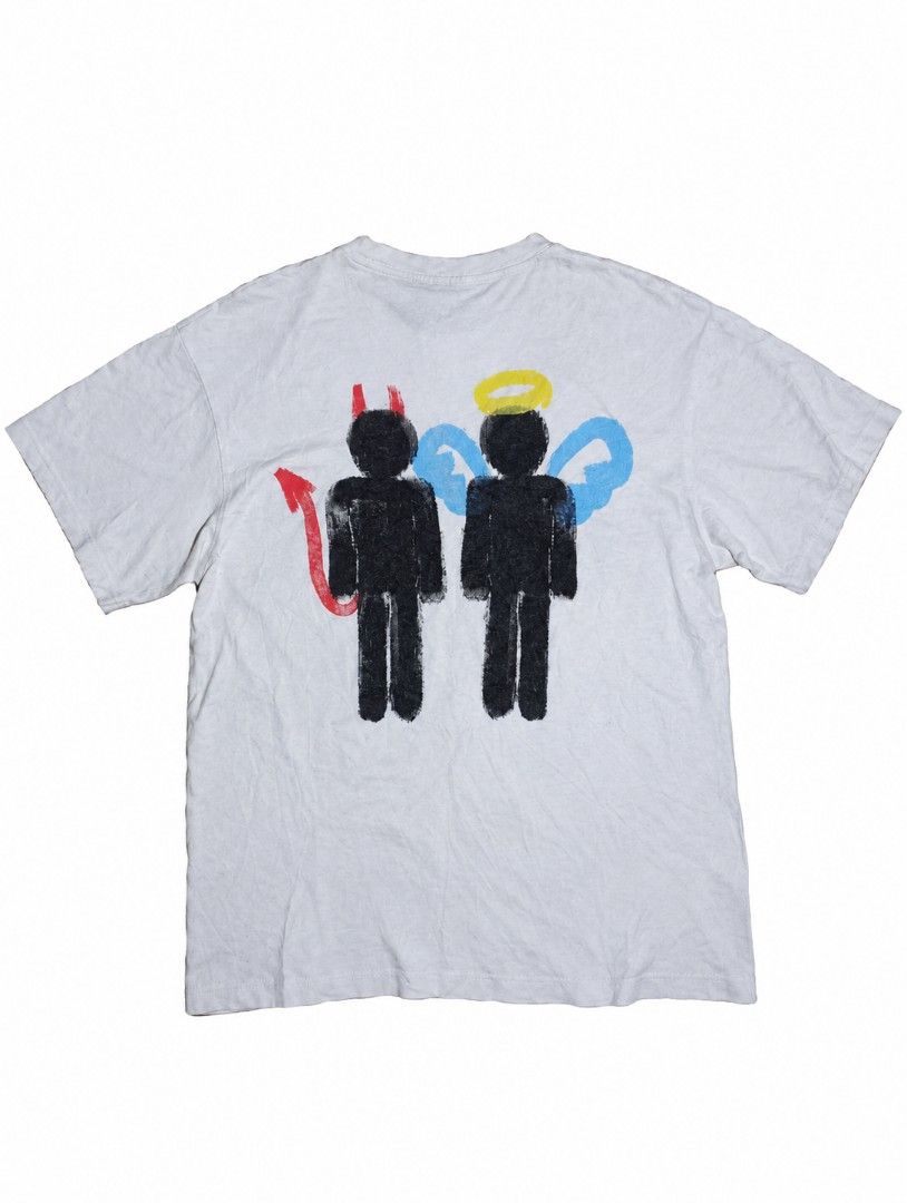 TEACH PEACE SHIRT (Category: Formal Shirts) located in Iligan City. Submitted by jydsale. (Listing ID 1468624689, Image 2). Description: 🤍 TEACH PEACE Graphic T-Shirt 😈😇 - White T-shirt with unique front and back graphics - Eye-catching devil and angel design on the back - Colorful “TEACH PEACE” graphic on the front - Classic crew neck with short sleeves - Perfect for casual wear and streetwear outfits - Thrifted item with visible signs of use