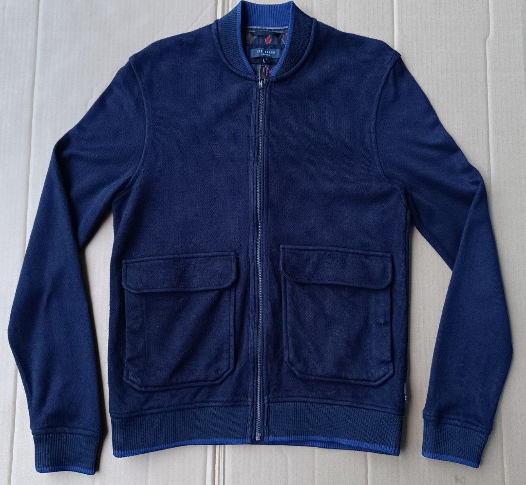 Ted Baker Mens Navy Blue Double Front Pocket Bomber Jacket (Category: Coats, Jackets and Outerwear) located in Bacoor. Submitted by nineties_kid (Listing ID 1468589240, Image 2). Description: <==• Ted Baker Mens Navy Blue Double Front Pocket Bomber Jacket Size: Extra Small (fits small also) Shoulder width: 17 inches Sleeve length: 25 inches Jacket width: 19 inches (Armpit-armpit) Jacket length: 26.5 inches _________________________ -Modes Of Deli