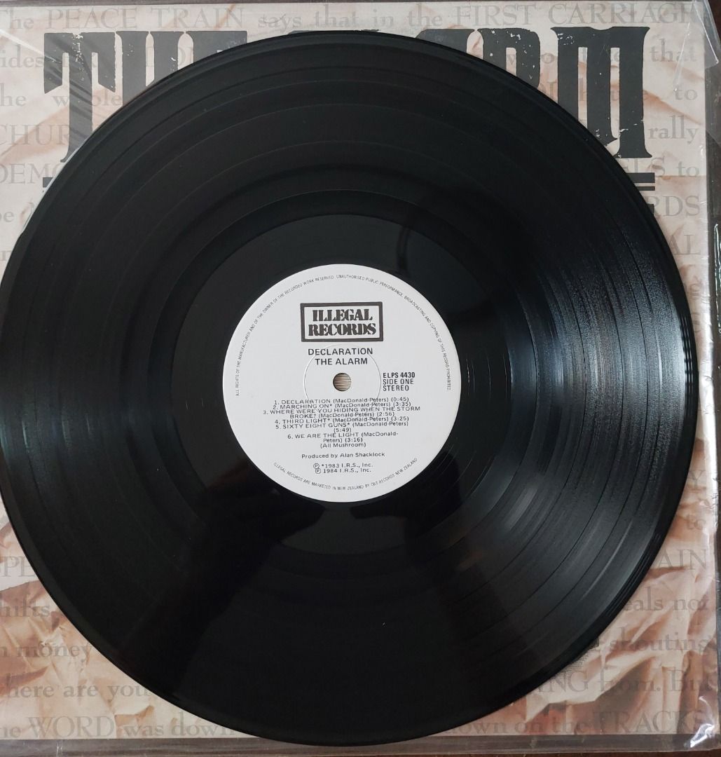 The Alarm Declaration Vinyl Record LP Illegal Records (Category: Vinyls) located in Quezon City. Submitted by safefish_95f205 (Listing ID 1468533822, Image 3). Description: - Artist & Album: The Alarm - Declaration Vinyl LP - Label: Illegal Records (clear center labels) - Key Tracks: Declaration, Marching On, Where Were You Hiding When The Storm Broke?, Sixty Eight Guns - Sleeve Details: Features band photos and lyrics context - Condition: Great 