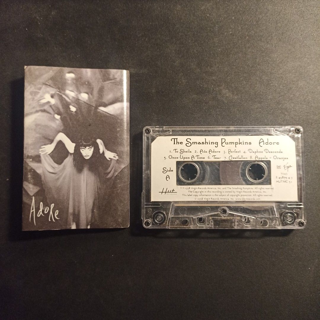 The Smashing Pumpkins - 'Adore' Cassette Tape (Category: CDs & DVDs) located in Las Pinas. Submitted by kanzakiro (Listing ID 1468656359, Image 1). Description: Condition: - Inlay: EX | Tape: VG++ - No molds - Fully tested and play well on both sides - Cases are not graded and may have cracks, scratches, or signs of aging No to COD / COP No reservation and first to pay basis. Loc: Las Piñas City, Metro Manila MOD: Grab / Lalamove / LBC and J&T MO