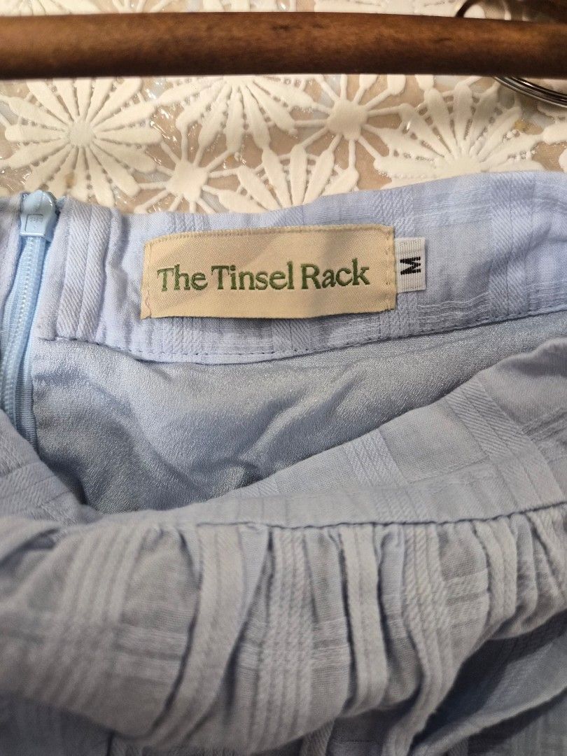 The Tinsel Rack Light Blue Two-Piece Midi Set Size M (Category: Sets or Coordinates) located in Manila. Submitted by prelovedbyc.hannah (Listing ID 1468584030, Image 3). Description: - Brand: The Tinsel Rack - Color: Light Blue - Set includes: Cropped spaghetti strap top with back zipper and tiered midi skirt - Size: M for skirt and L for top - Material: Textured plaid fabric with full lining.