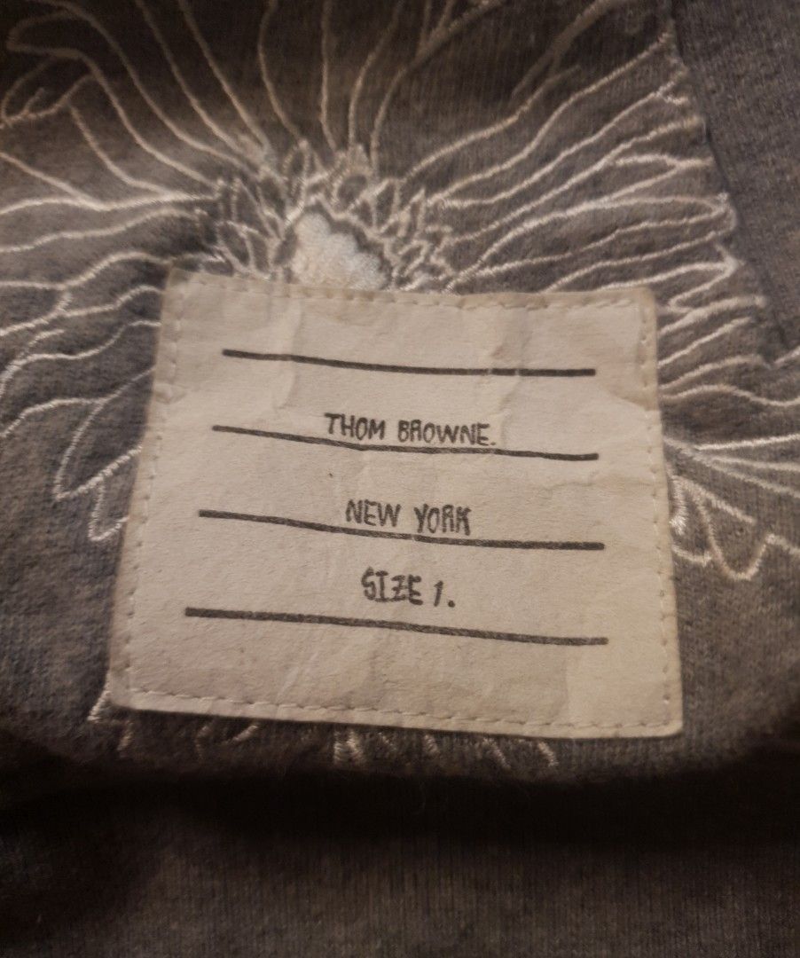 Thom browne AOP Hoodie (Category: Coats, Jackets and Outerwear) located in San Fernando. Submitted by retro.district. (Listing ID 1468709624, Image 2). Description: - Thom Browne AOP hoodie - Size: Small (20x23) - Condition: Excellent - No issue.