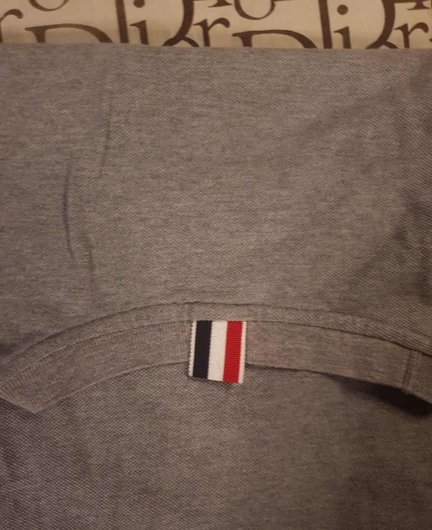 Thom browne tshirt (Category: Shirts) located in San Fernando. Submitted by retro.district. (Listing ID 1468712194, Image 3). Description: - Those Browne tshirt - Size: Large(Women's) Medium(Men's) - Condition: Excellent - issue: cut necktag -.