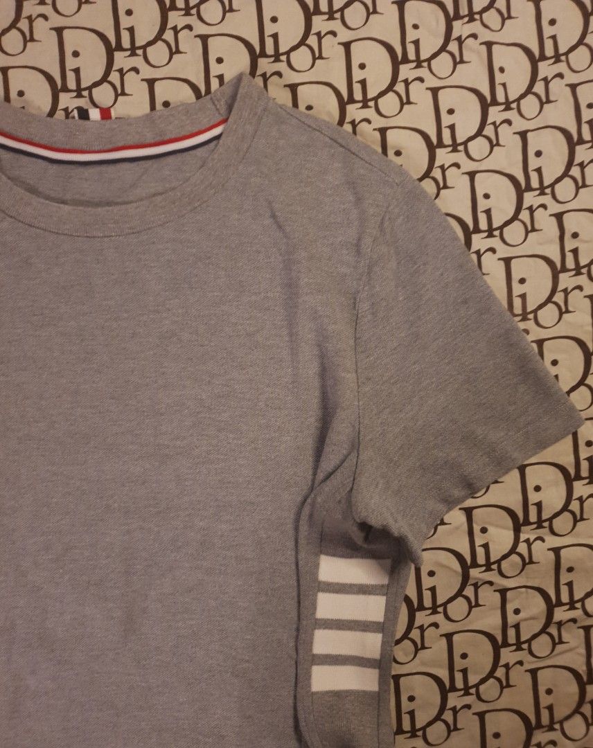 Thom browne tshirt (Category: Shirts) located in San Fernando. Submitted by retro.district. (Listing ID 1468712194, Image 2). Description: - Those Browne tshirt - Size: Large(Women's) Medium(Men's) - Condition: Excellent - issue: cut necktag -.