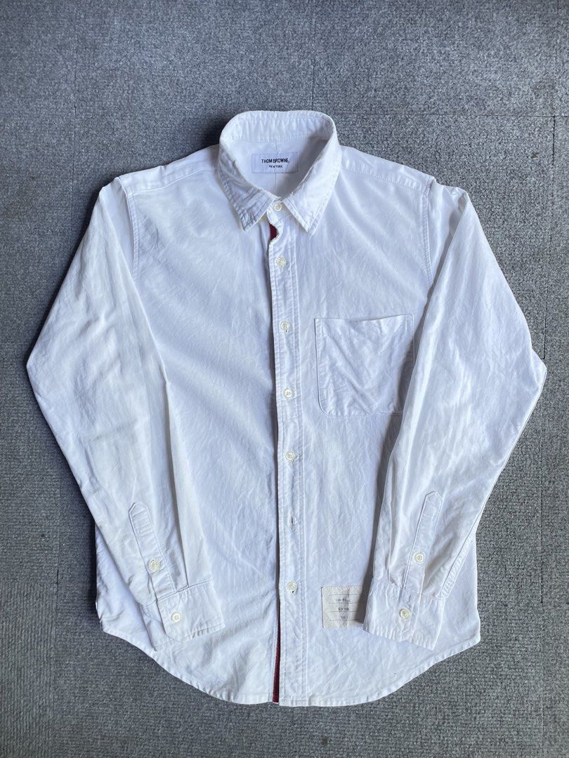 Thombrowne longsleeve button down (Category: Luxury Apparel) located in Tacloban City. Submitted by solothriftfinds (Listing ID 1468540032, Image 1). Description: Thombrowne long sleeve button down good condition No issue.