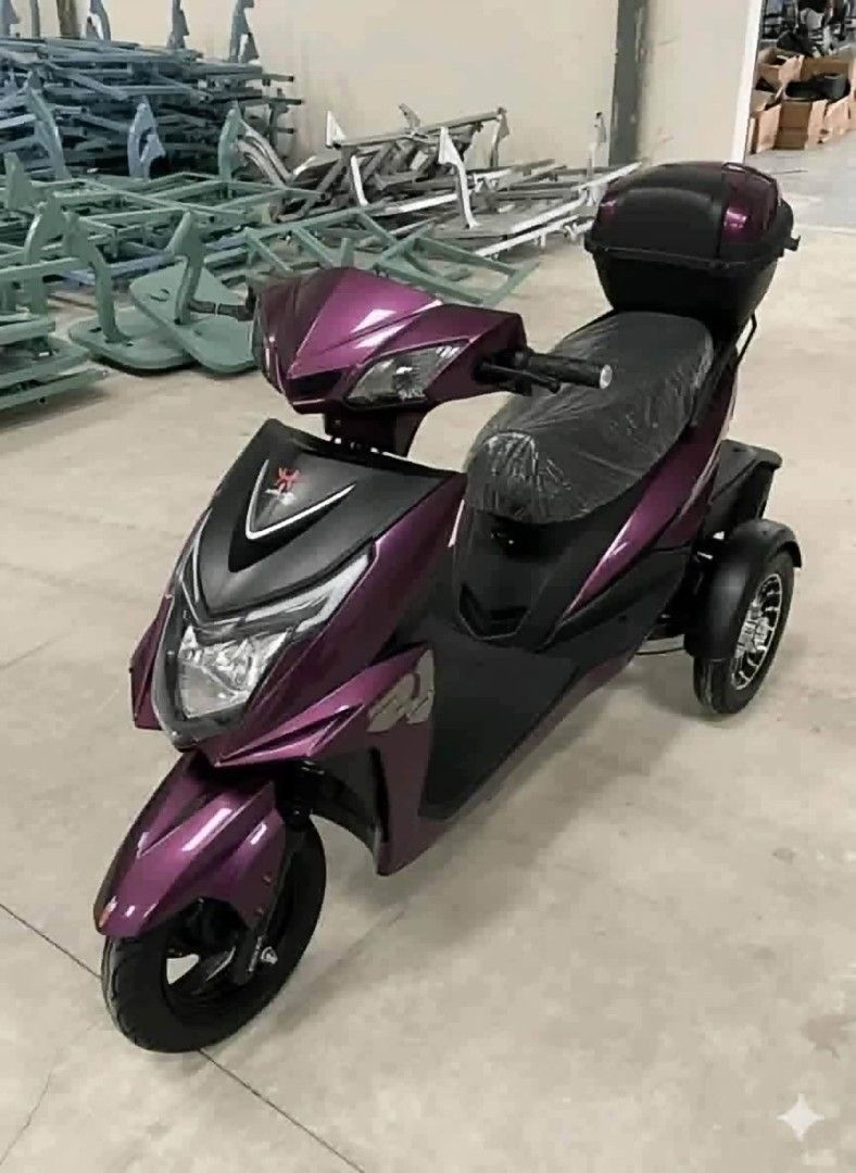 Three-Wheel Electric Mobility Scooter with Storage Box (Category: Announcements) located in Manila. Submitted by jayrinetoys2123 (Listing ID 1468540744, Image 3). Description: - Vibrant metallic finish with multiple colors available upon request - Dual rear wheels for enhanced stability and a smooth floorboard for easy step-on/off - Equipped with front cowl headlights for safe riding - Includes a convenient rear utility storage box for groceries 
