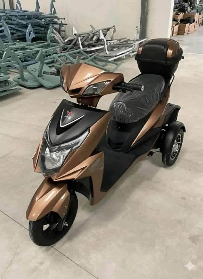 Three-Wheel Electric Mobility Scooter with Storage Box (Category: Announcements) located in Manila. Submitted by jayrinetoys2123 (Listing ID 1468540744, Image 1). Description: - Vibrant metallic finish with multiple colors available upon request - Dual rear wheels for enhanced stability and a smooth floorboard for easy step-on/off - Equipped with front cowl headlights for safe riding - Includes a convenient rear utility storage box for groceries 
